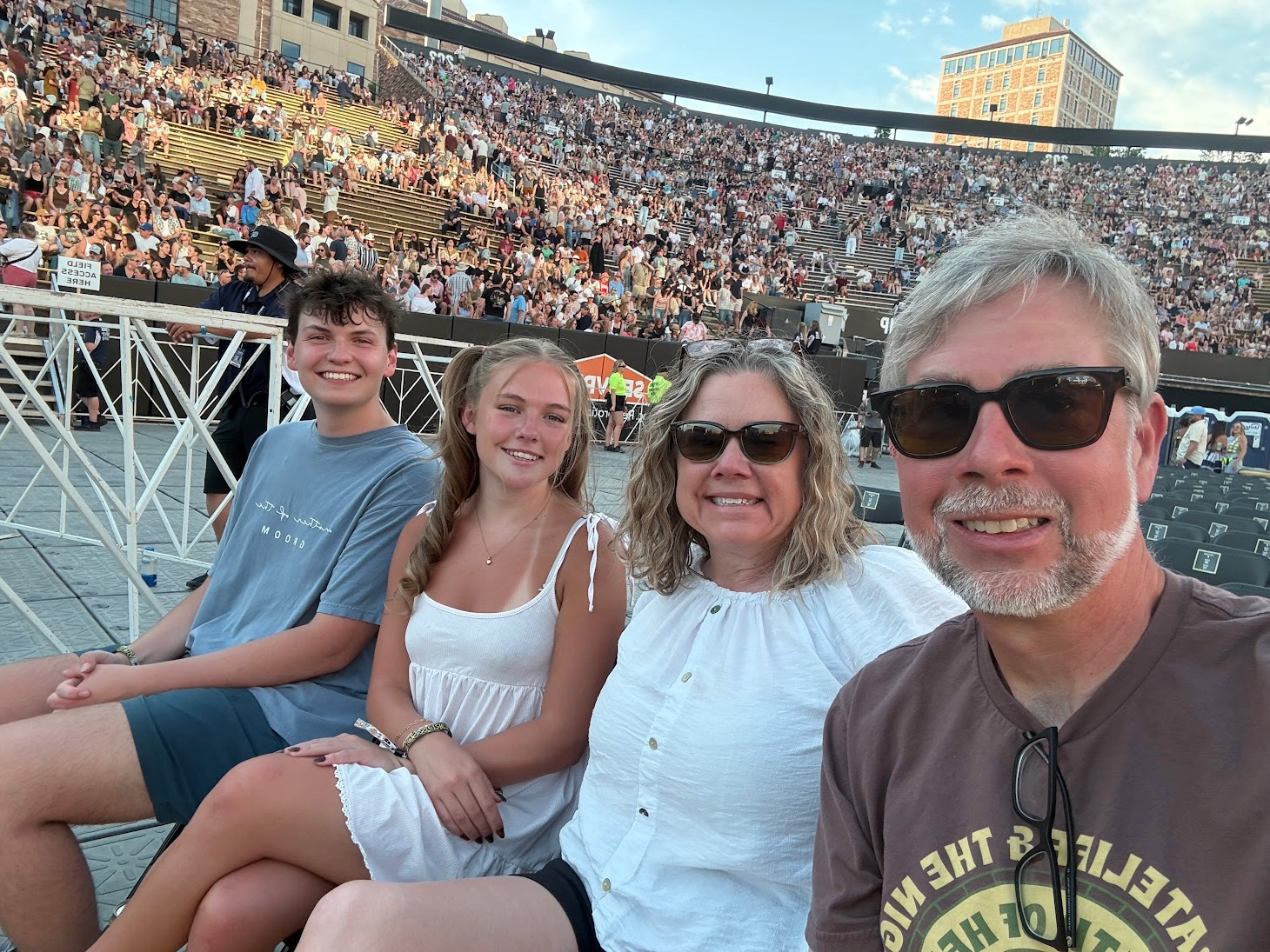 Carole C, Nathan P, Emily C, Luke M at Folsom Field in Boulder